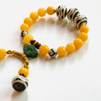 Three Huya Dzi bead Amber Bracelet