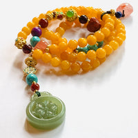 Old Amber Four CIrcles Buddha Beads
