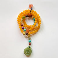Old Amber Four CIrcles Buddha Beads