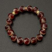 Tiger Tooth Dzi Bead Bracelet (红肉虎牙天珠)