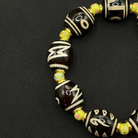 Multi-Treasure Dzi Bracelet
(小木马达洛多宝天珠手串)