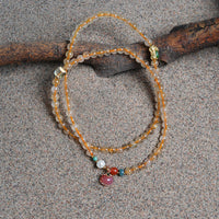 Three-circle yellow crystal peach pendant bracelet