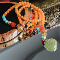 Old Amber Four CIrcles Buddha Beads