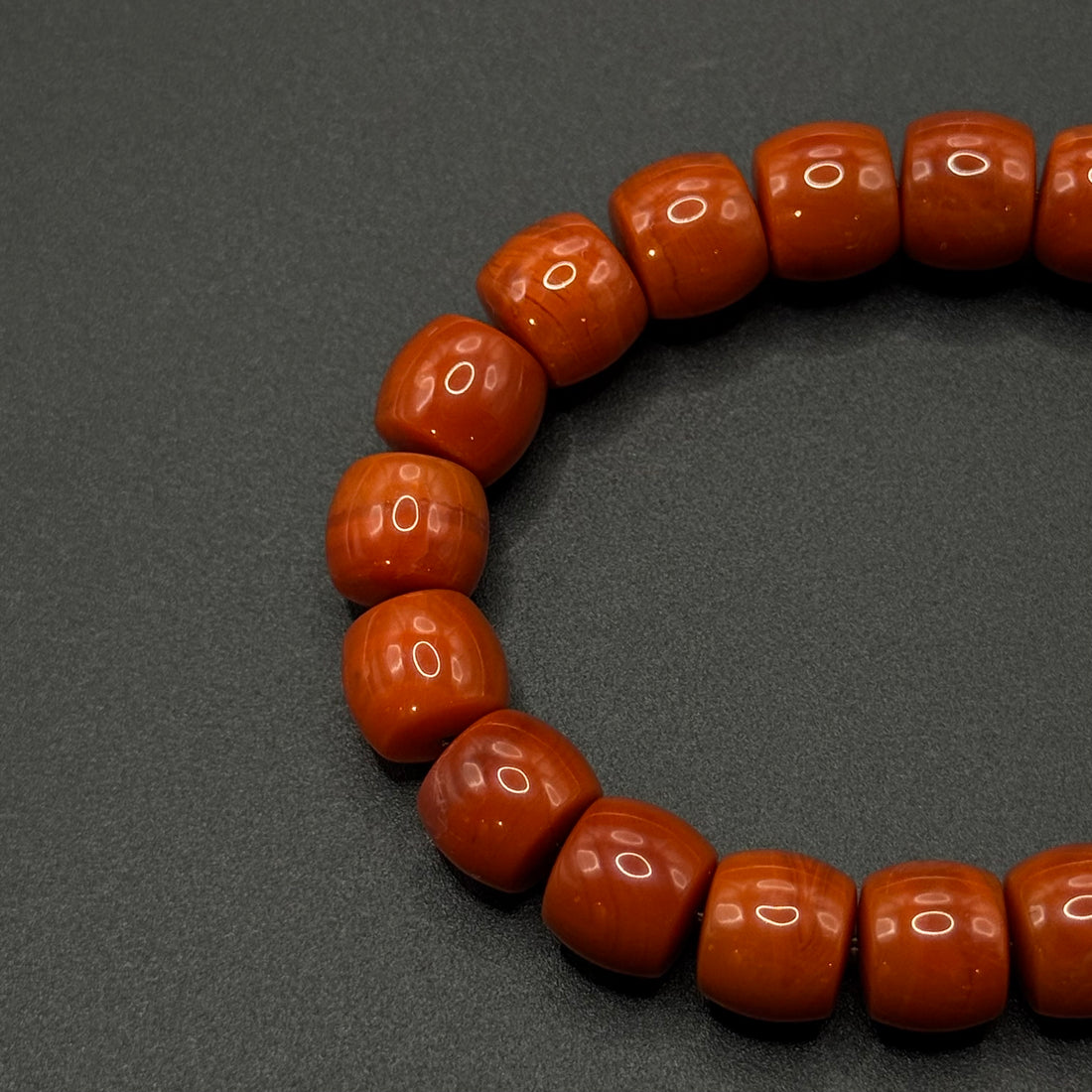 Nine--eyed Dzi bead Southred Agate Bracelet (九眼天珠柿子红南红手串）