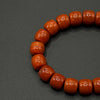 Nine--eyed Dzi bead Southred Agate Bracelet (九眼天珠柿子红南红手串）