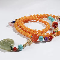 Old Amber Four CIrcles Buddha Beads