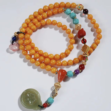 Old Amber Four CIrcles Buddha Beads