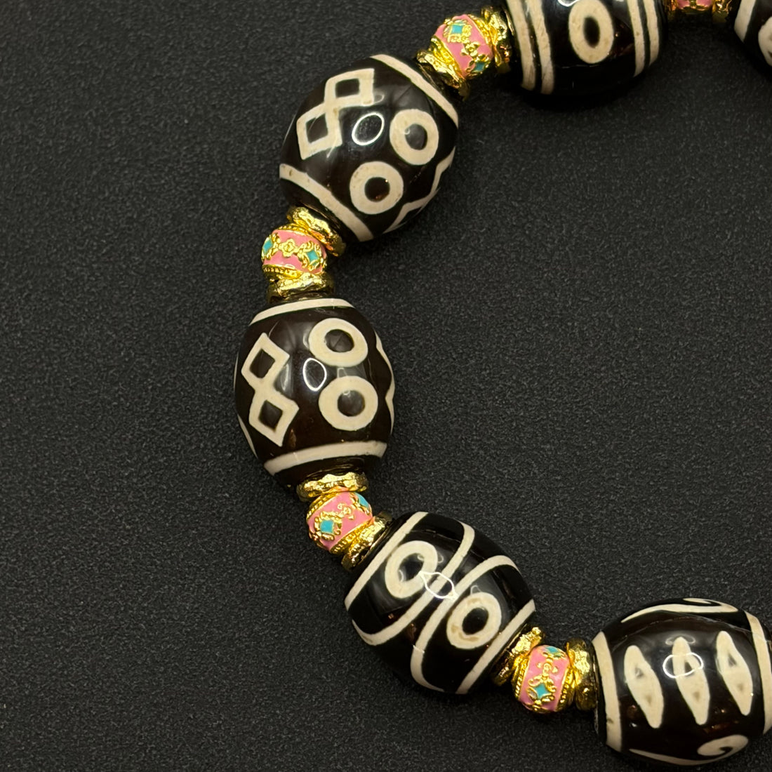 Multi-Treasure Dzi Bracelet
（小木马达洛多宝天珠手串）