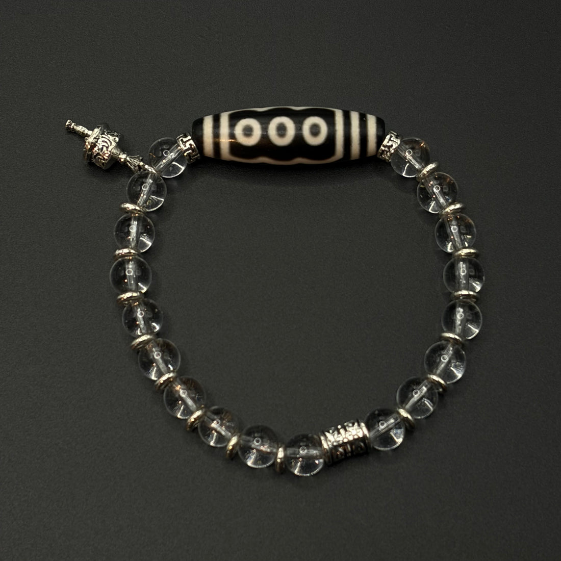 Five-Eye Dzi Bead & Himalayan Clear Quartz Bracelet
 （五眼天珠喜马拉雅白水晶手串）