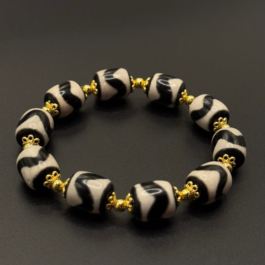 Tiger Tooth Dzi Bead Bracelet（虎牙天珠手串）