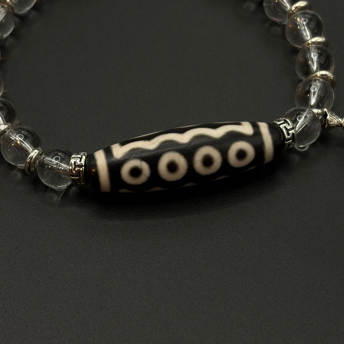 Five-Eye Dzi Bead & Himalayan Clear Quartz Bracelet
 （五眼天珠喜马拉雅白水晶手串）