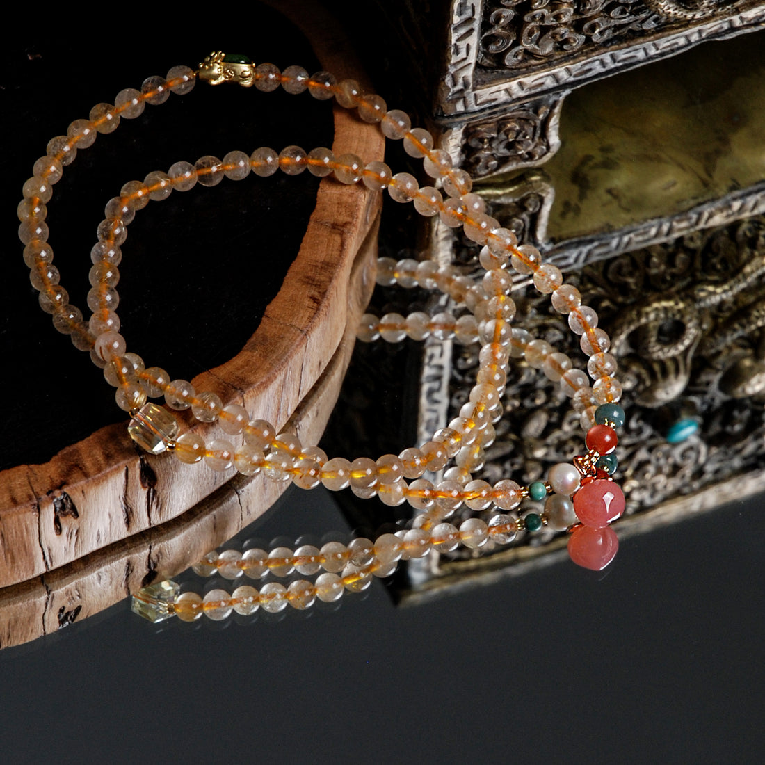 Three-circle yellow crystal peach pendant bracelet