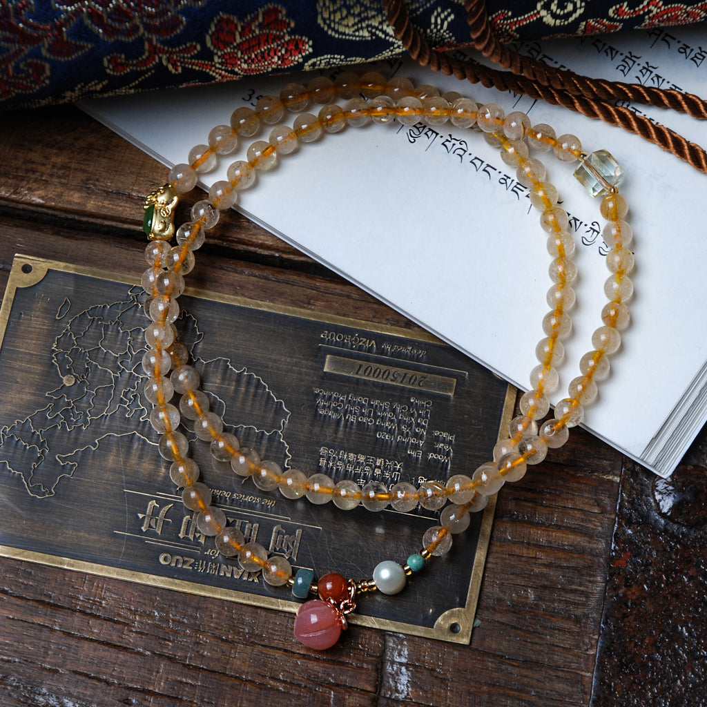 Three-circle yellow crystal peach pendant bracelet