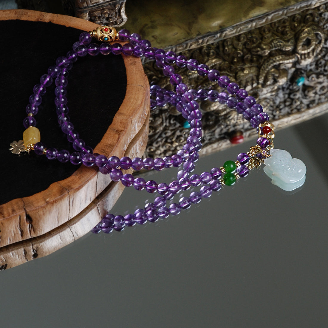 Three circles of amethyst and jade fox bracelet
