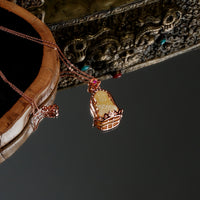 Amber Buddha Pendant